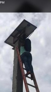 Rose checks out solar panel